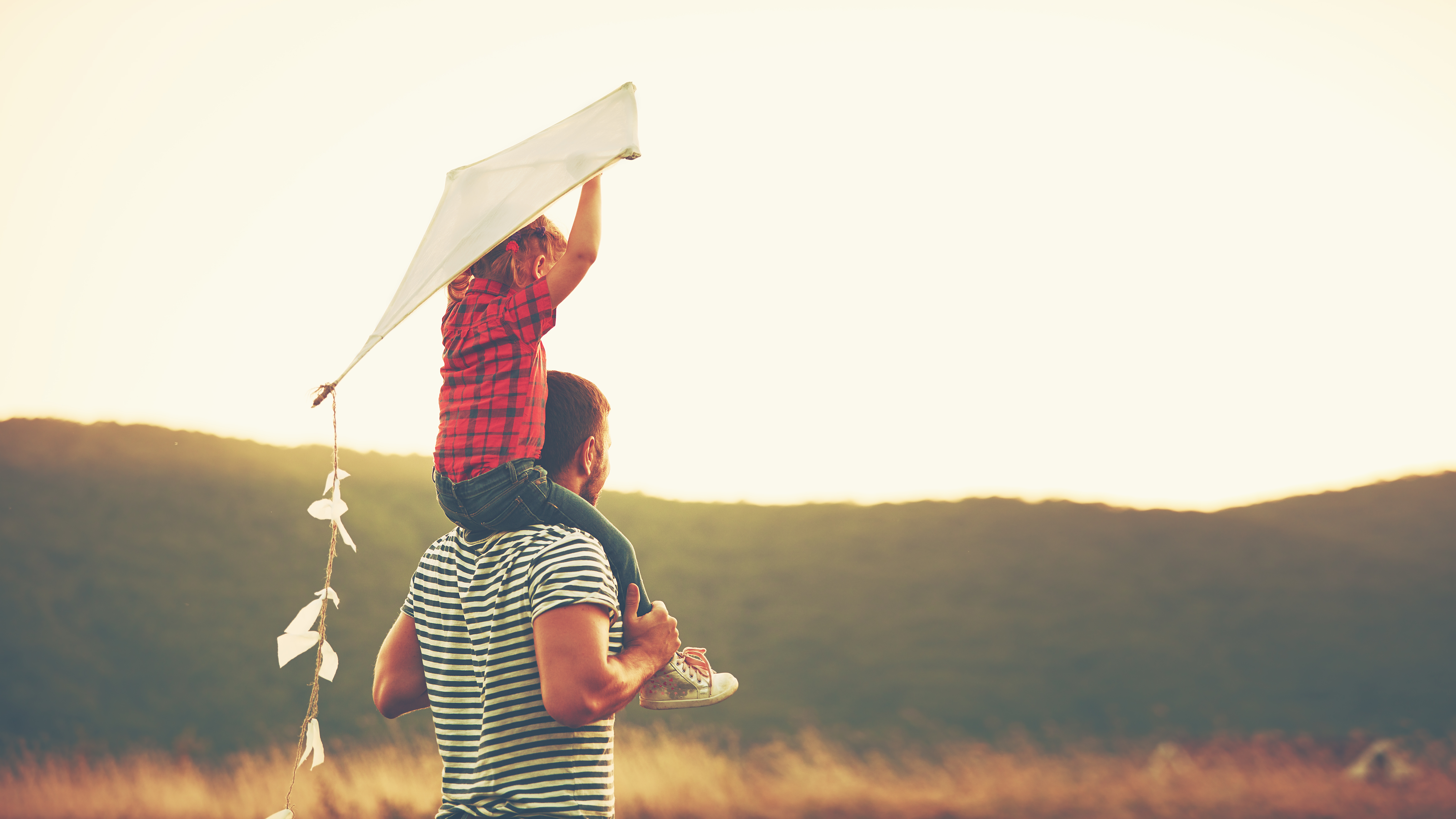 A parent and child outdoors